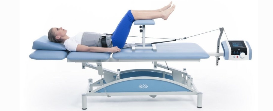 kéo giãn + sóng ngắn +tens trị đau lưng, thoái hóa cột sống